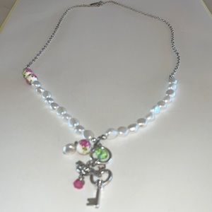 Plunder pearl and key charm necklace.